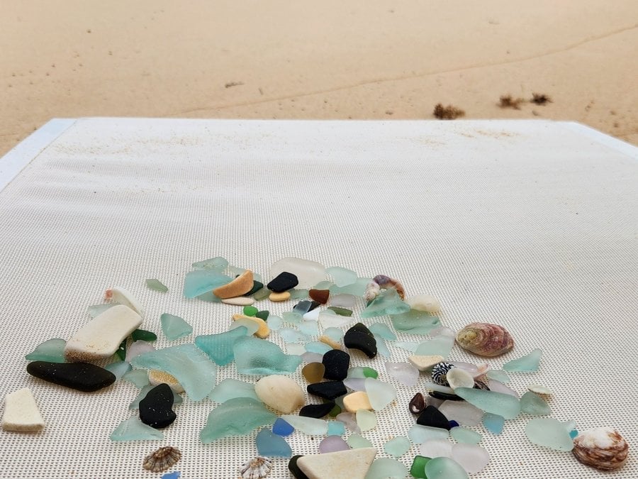 Assorted sea glass pieces in soft coastal tones
